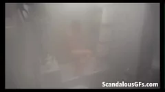 Play Watch my stunning ex-girlfriend with long brunette hair and a shaved pussy enjoying a steamy solo shower in a luxury bathroom.